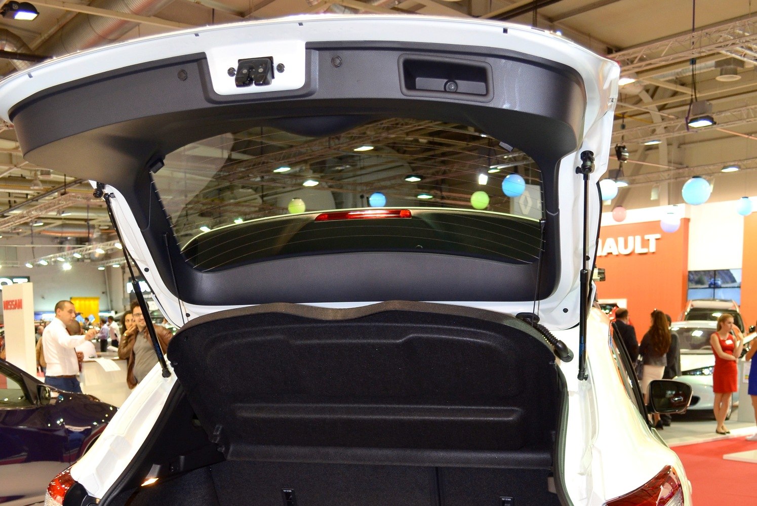 Open rear hatch with visible trunk space and hatchback door interior.