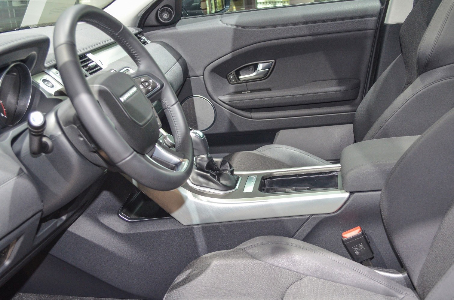 Interior steering wheel and center console with gear shifter and front seats