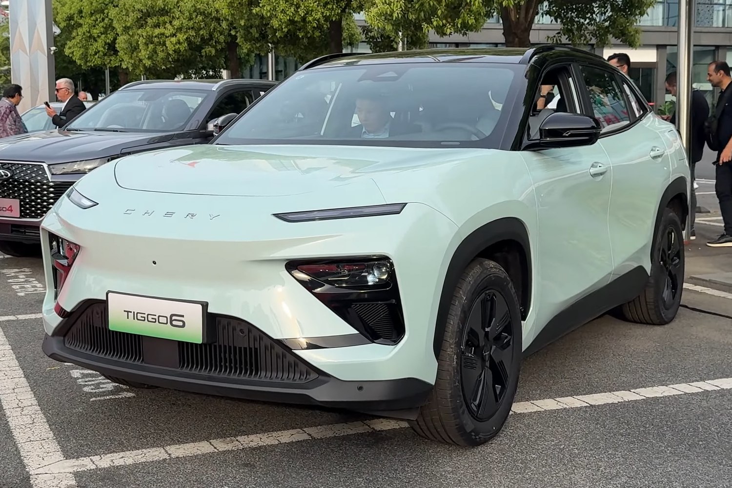 Front and side view of a modern SUV with slim LED lights and black alloy wheels