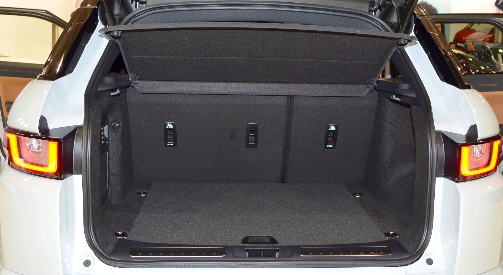 Spacious SUV trunk interior with rear lighting and foldable rear seats
