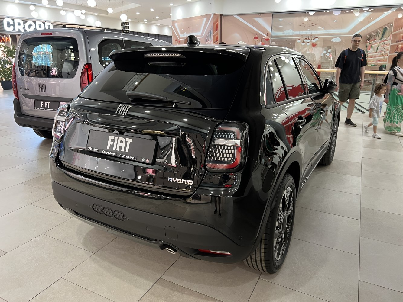 Rear view with LED tail lights and hybrid badge
