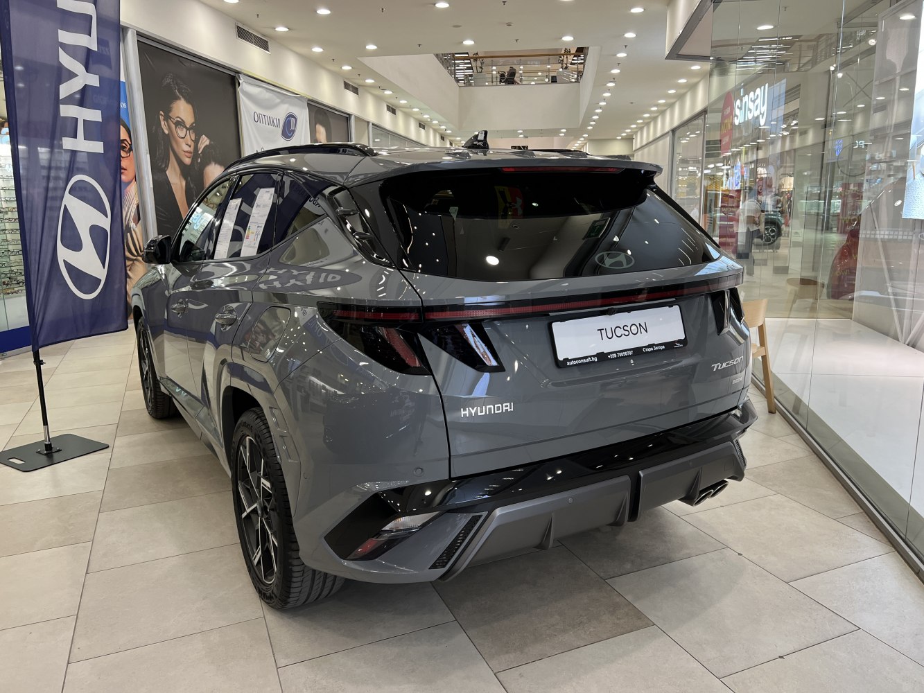 Rear view of facelifted SUV with LED tail lights and sporty bumper diffuser