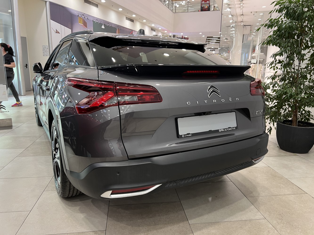 Rear view of a sleek SUV with distinctive angular taillights and streamlined design