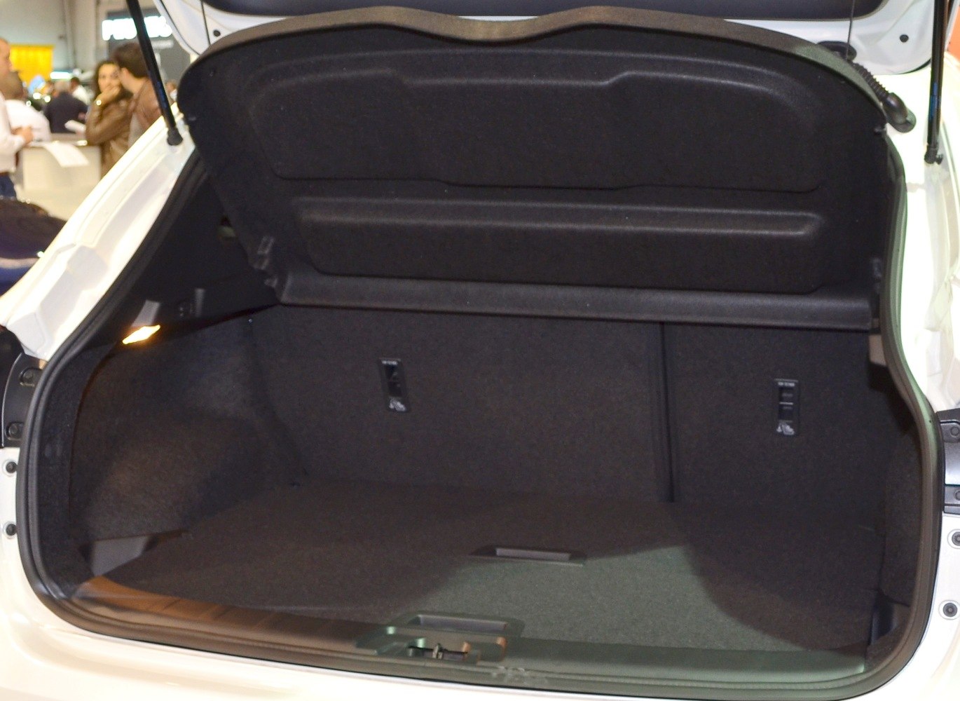 Spacious and well-lit rear cargo space with foldable cover