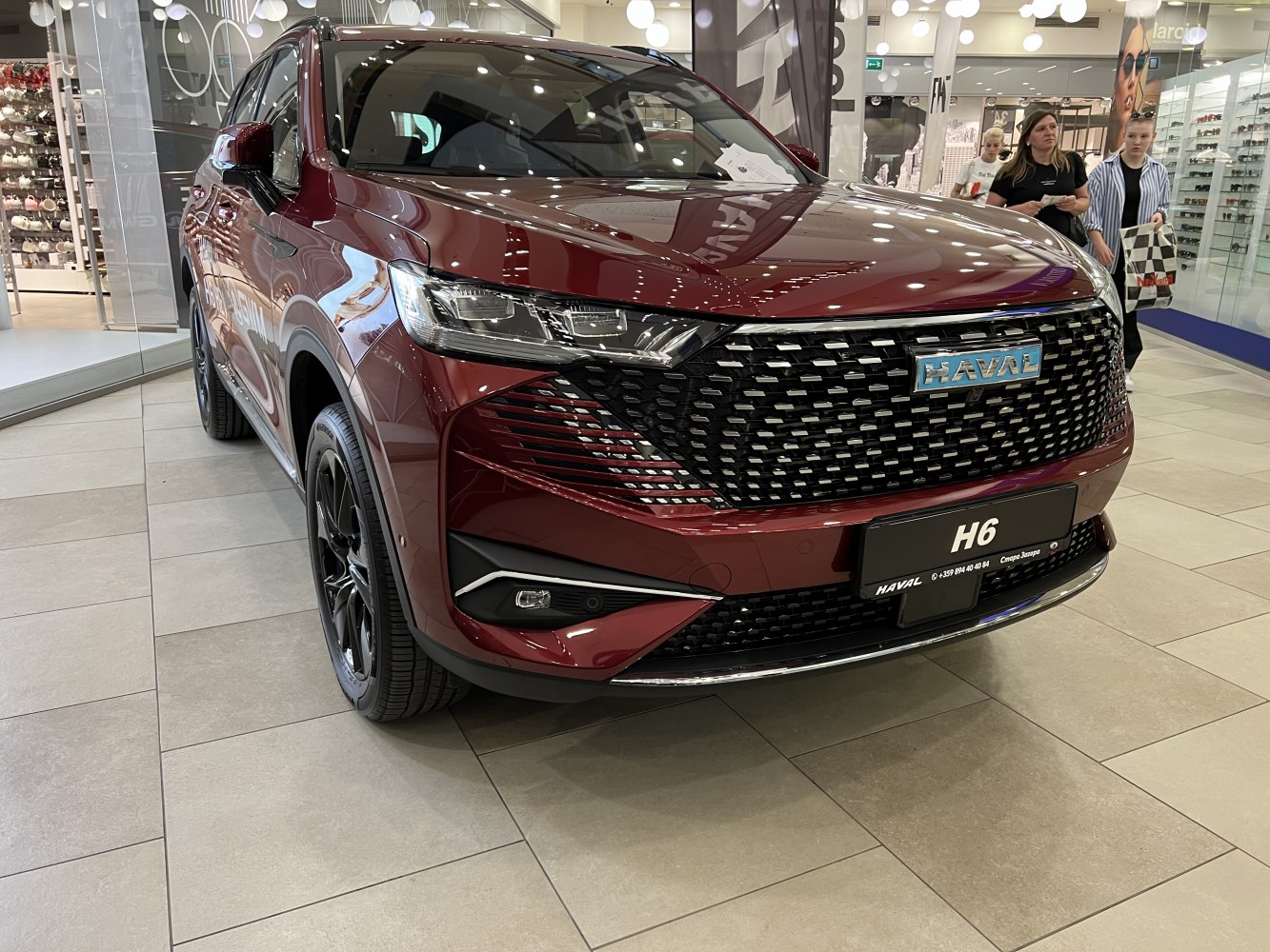 Front view with large grille and LED headlights