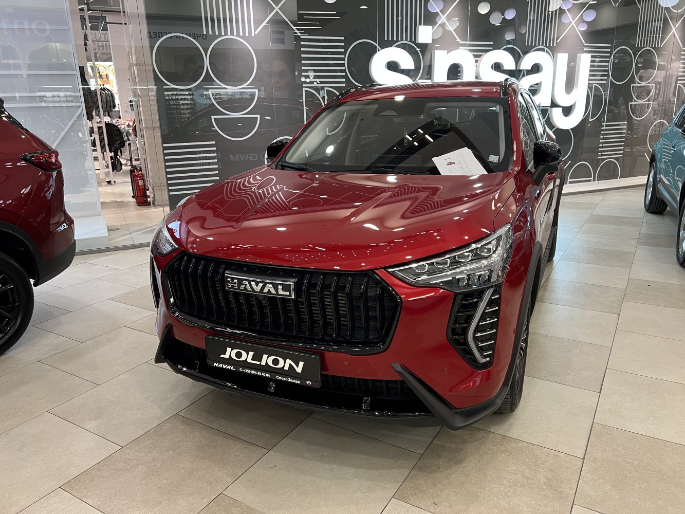 Aggressive front grille and sharp LED headlights of a modern SUV