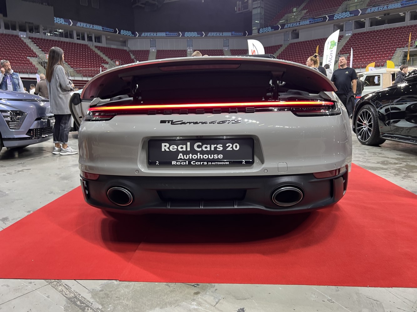 Rear of convertible coupe with LED light strip and dual exhausts