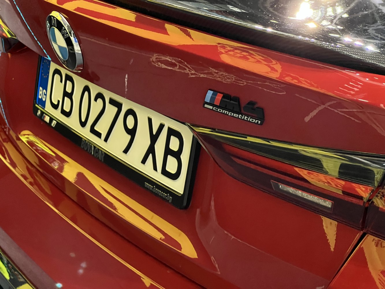 Rear badge and taillight of BMW M4 Competition model