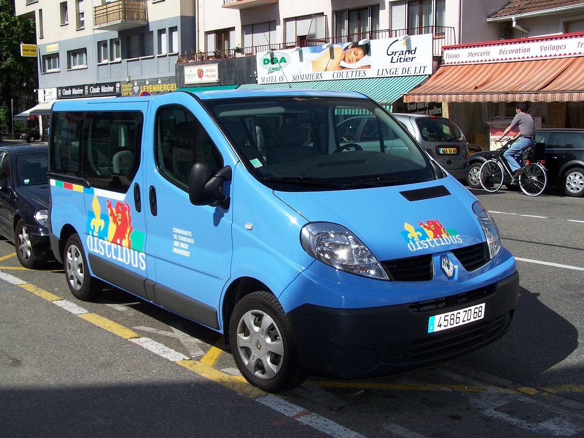 Blue van with Distirbus logo and multiple doors