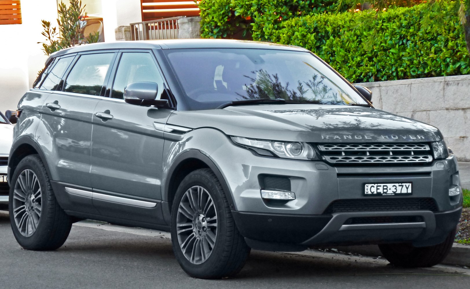 Front-side view with sleek headlights and alloy wheels