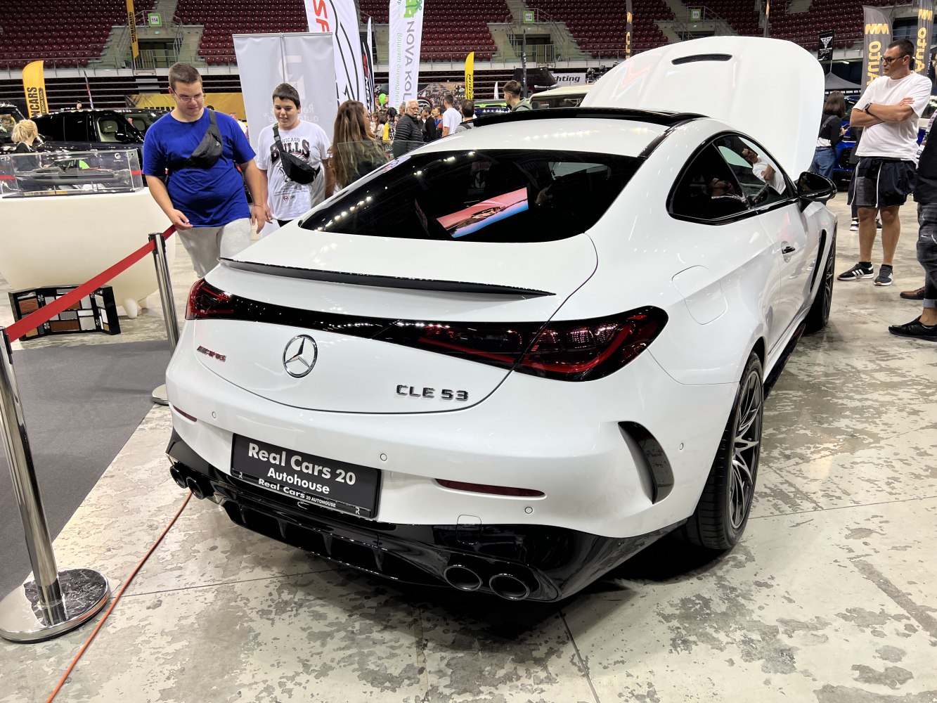Sleek rear view with taillights and quad exhausts