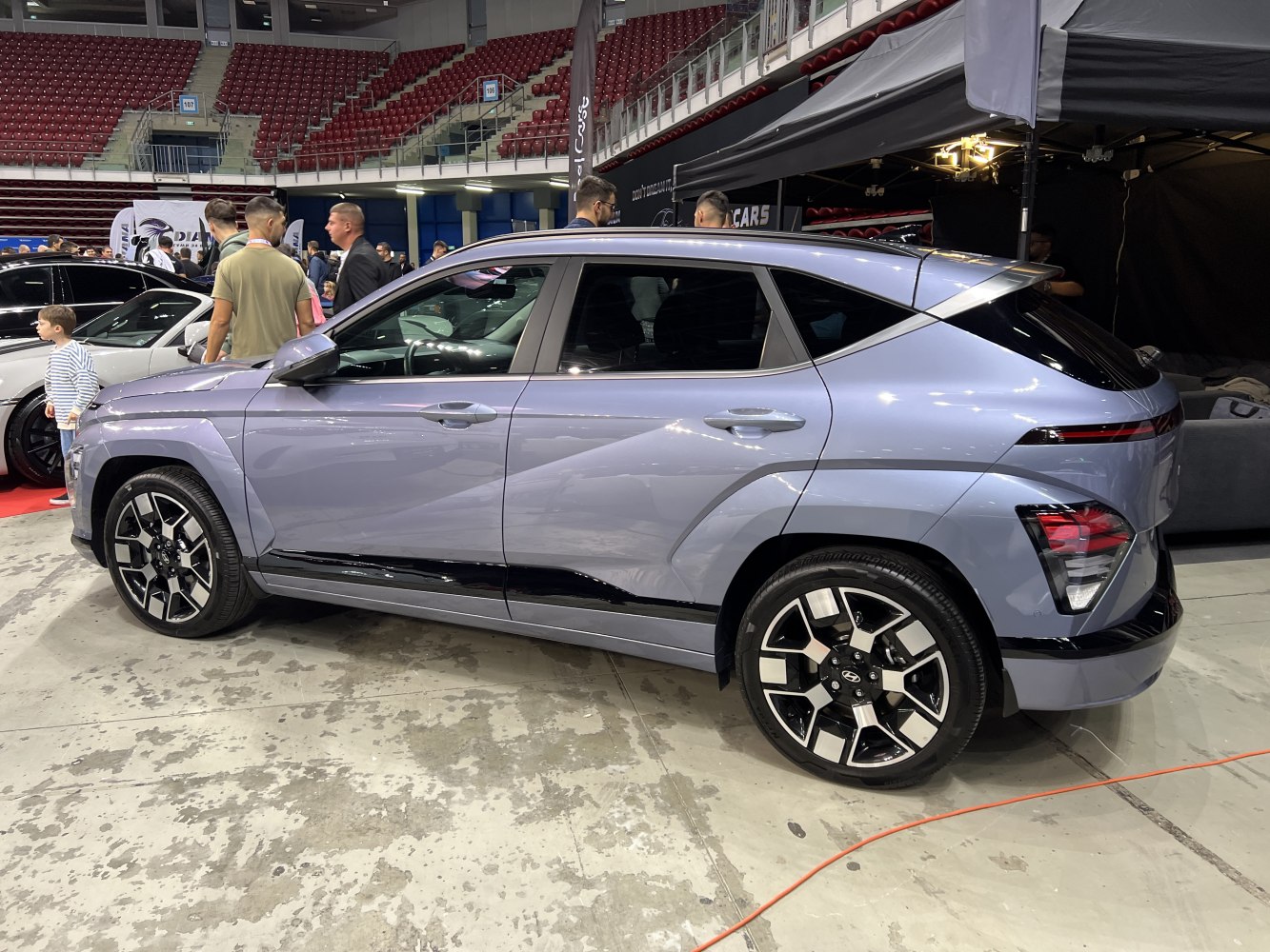 Side profile and rear design of a modern SUV with sharp lines and alloy wheels