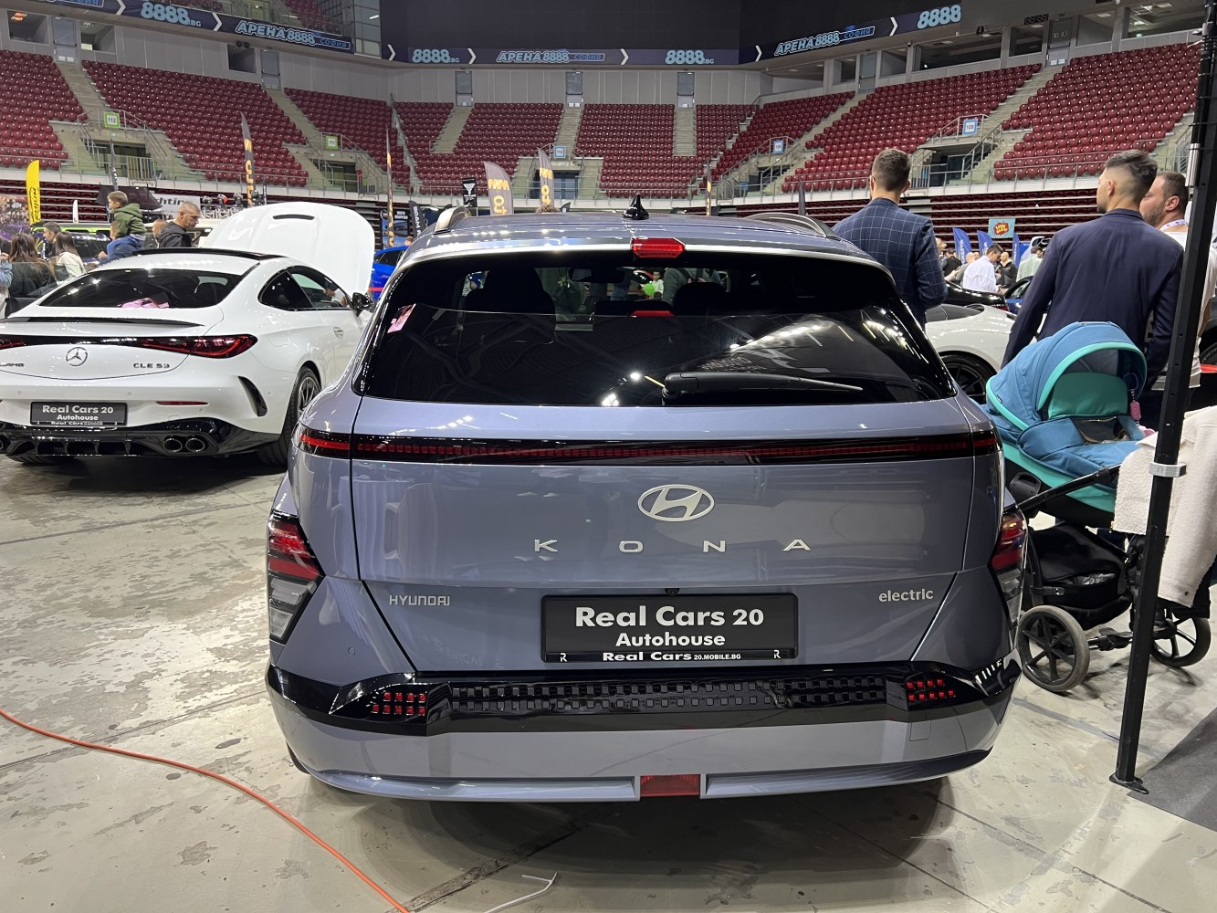 Rear view of an electric vehicle with LED taillights and modern hatchback styling