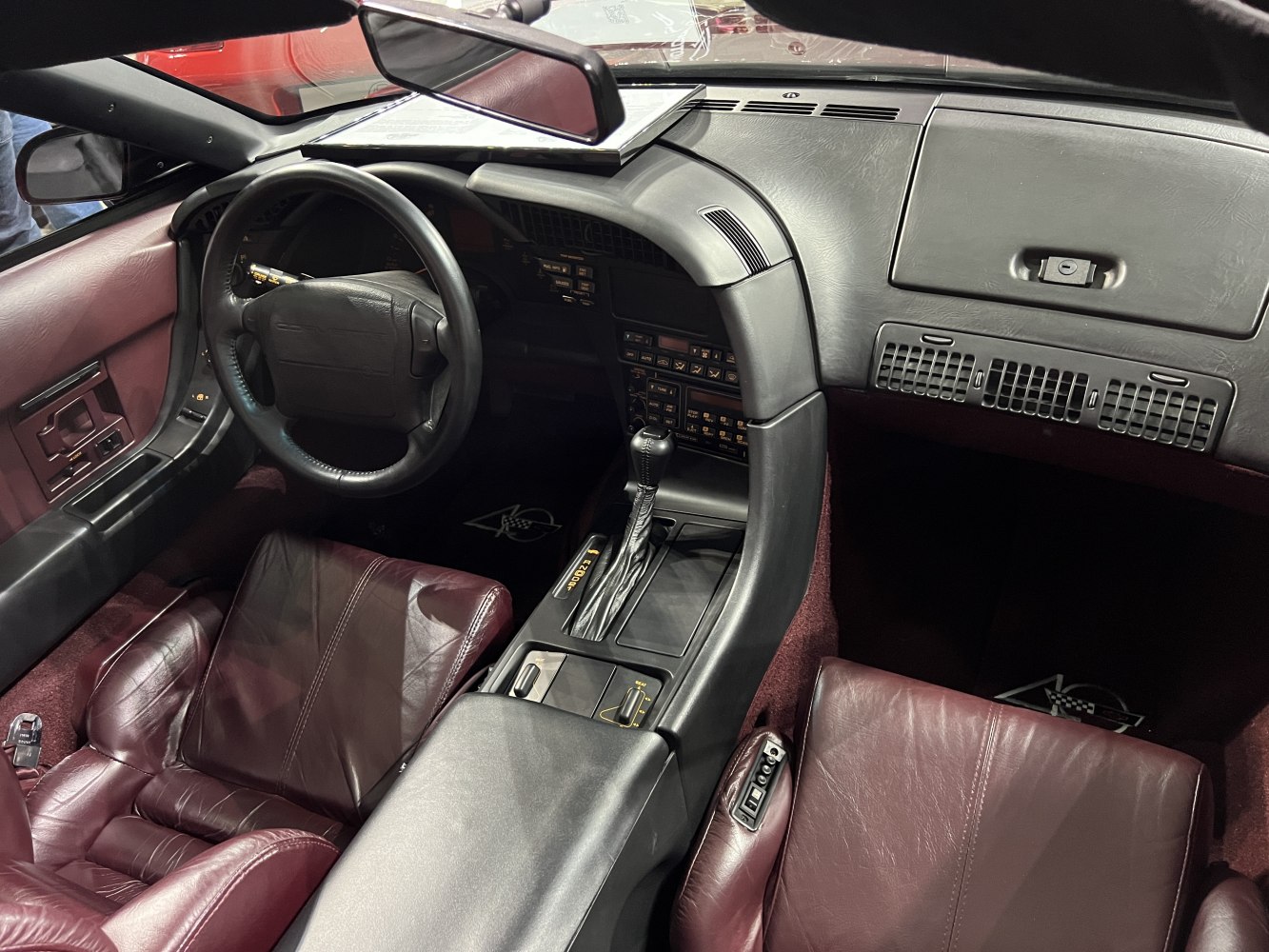 Leather bucket seats and center console with gear shift in convertible interior