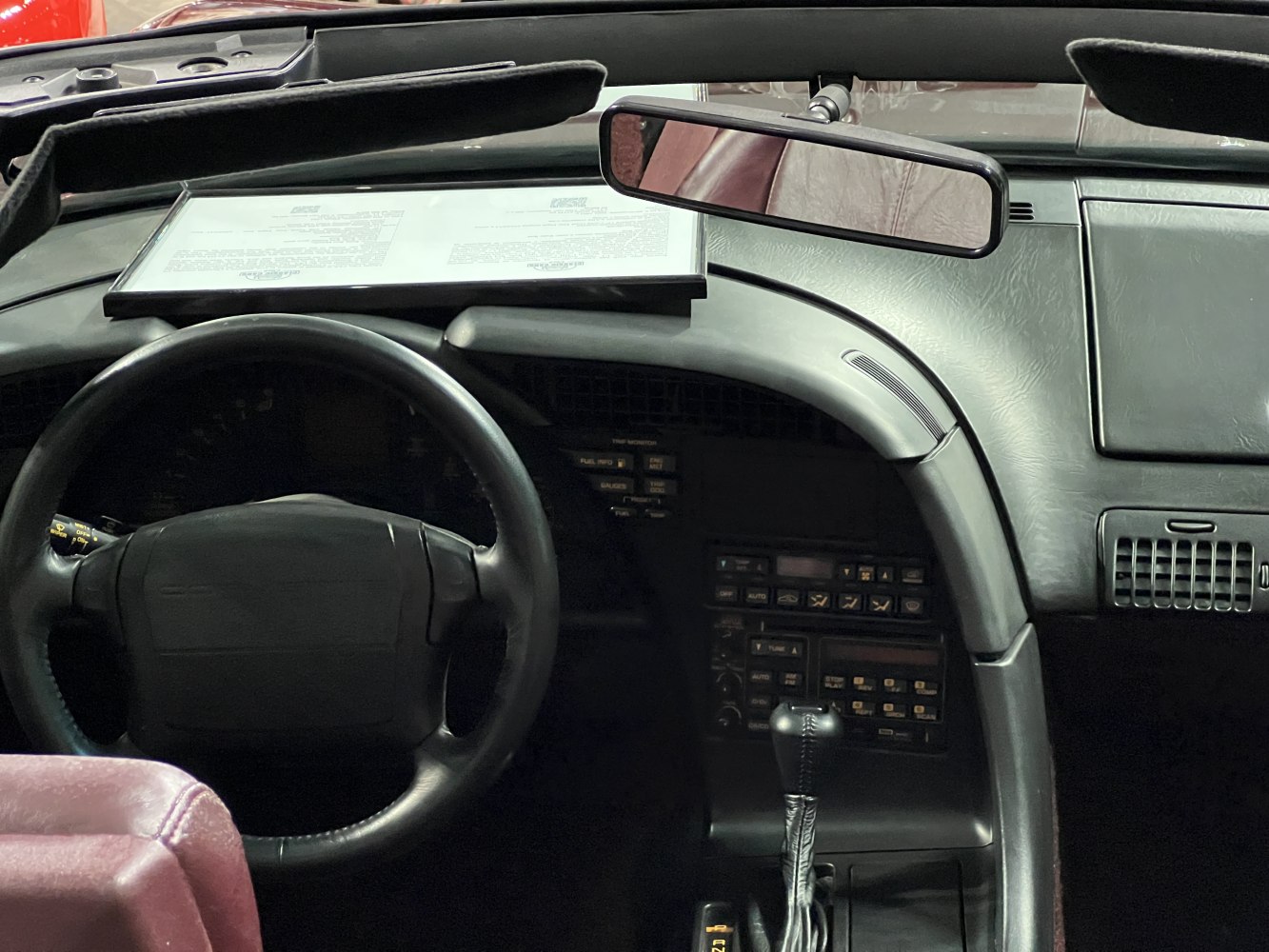 Steering wheel and center console of a convertible car interior