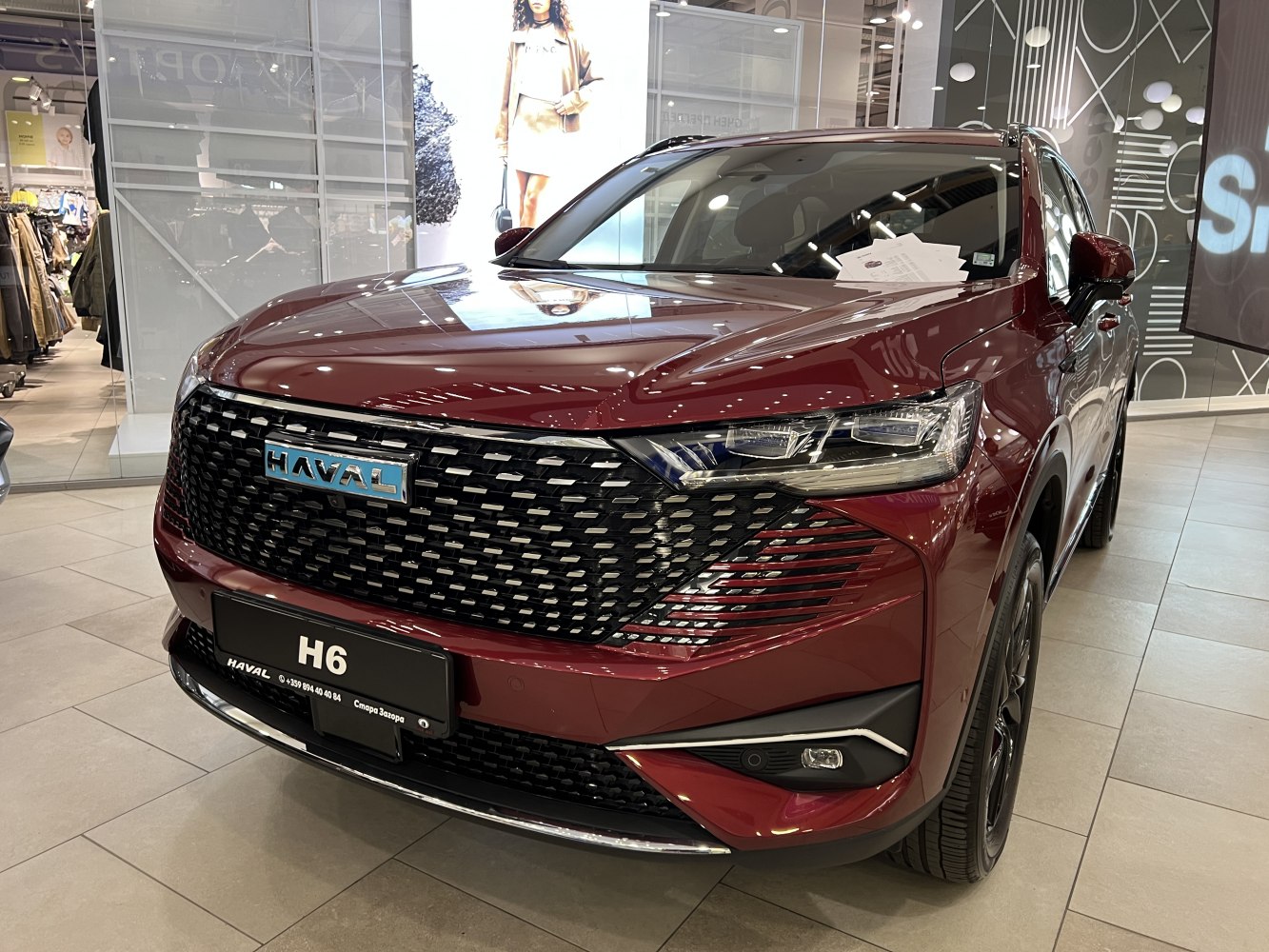 Bold textured front grille and sharp LED headlights of a modern SUV