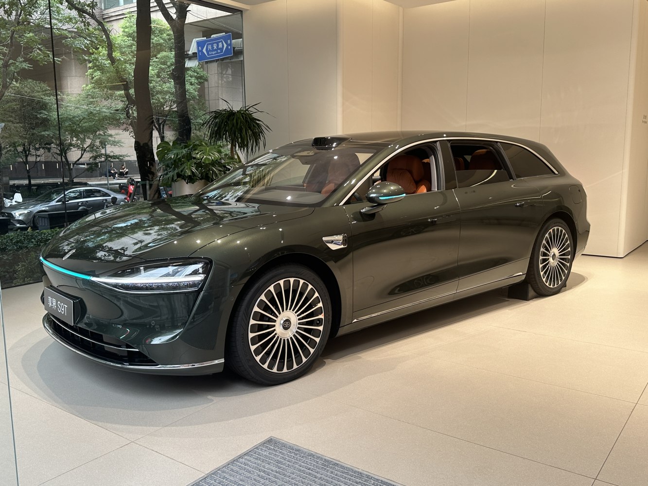 Luxury electric wagon with LED headlights and turbine-style alloy wheels.