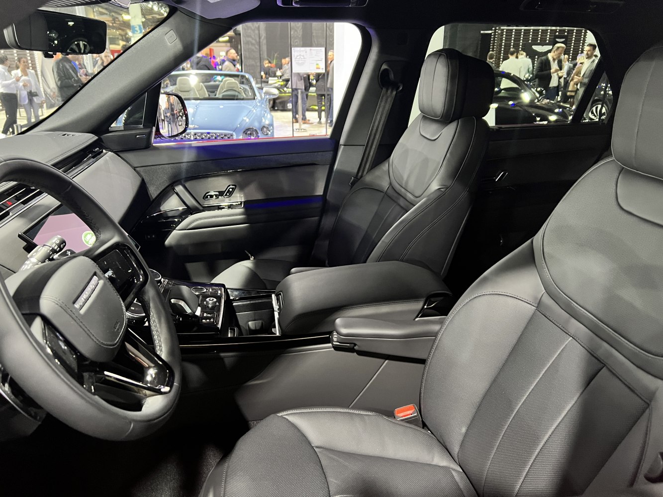 Luxury black leather seats and modern digital dashboard inside vehicle interior