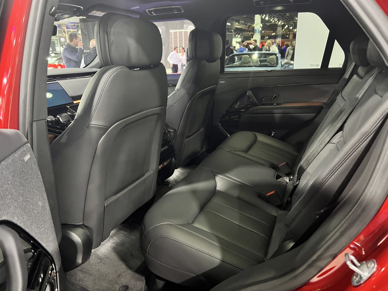 Black leather rear seats with spacious, modern SUV interior design