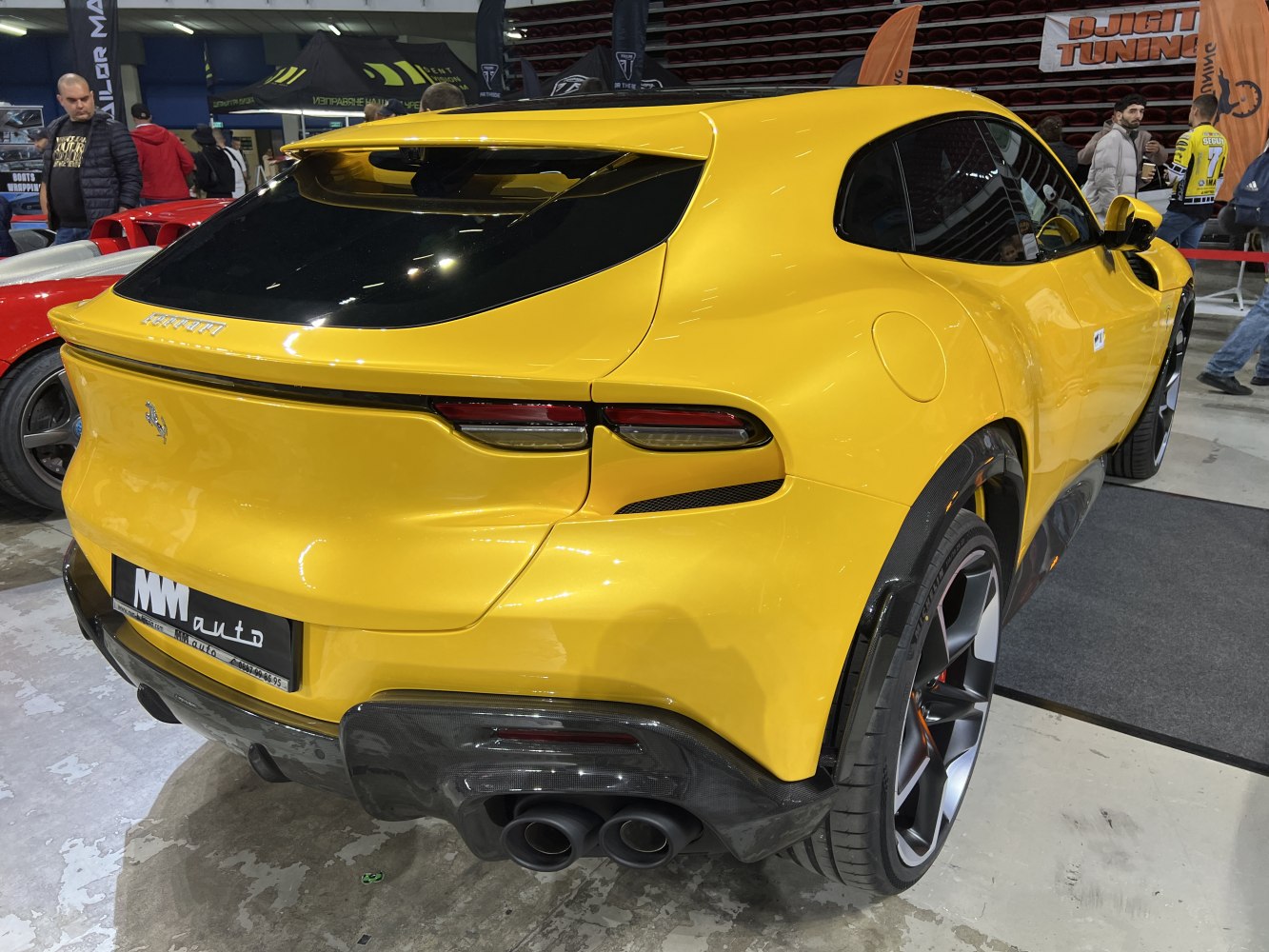 Sporty SUV rear with quad exhausts and sleek taillights