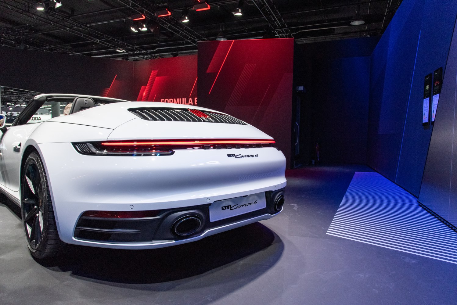 Rear view of convertible with LED tail light strip and dual exhausts