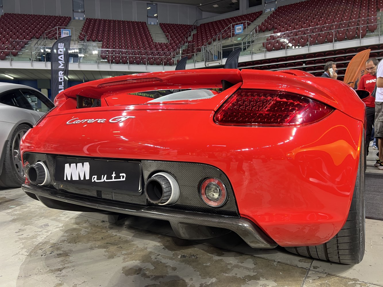 Rear view showing Porsche Carrera GT's dual exhausts and carbon fiber diffuser.