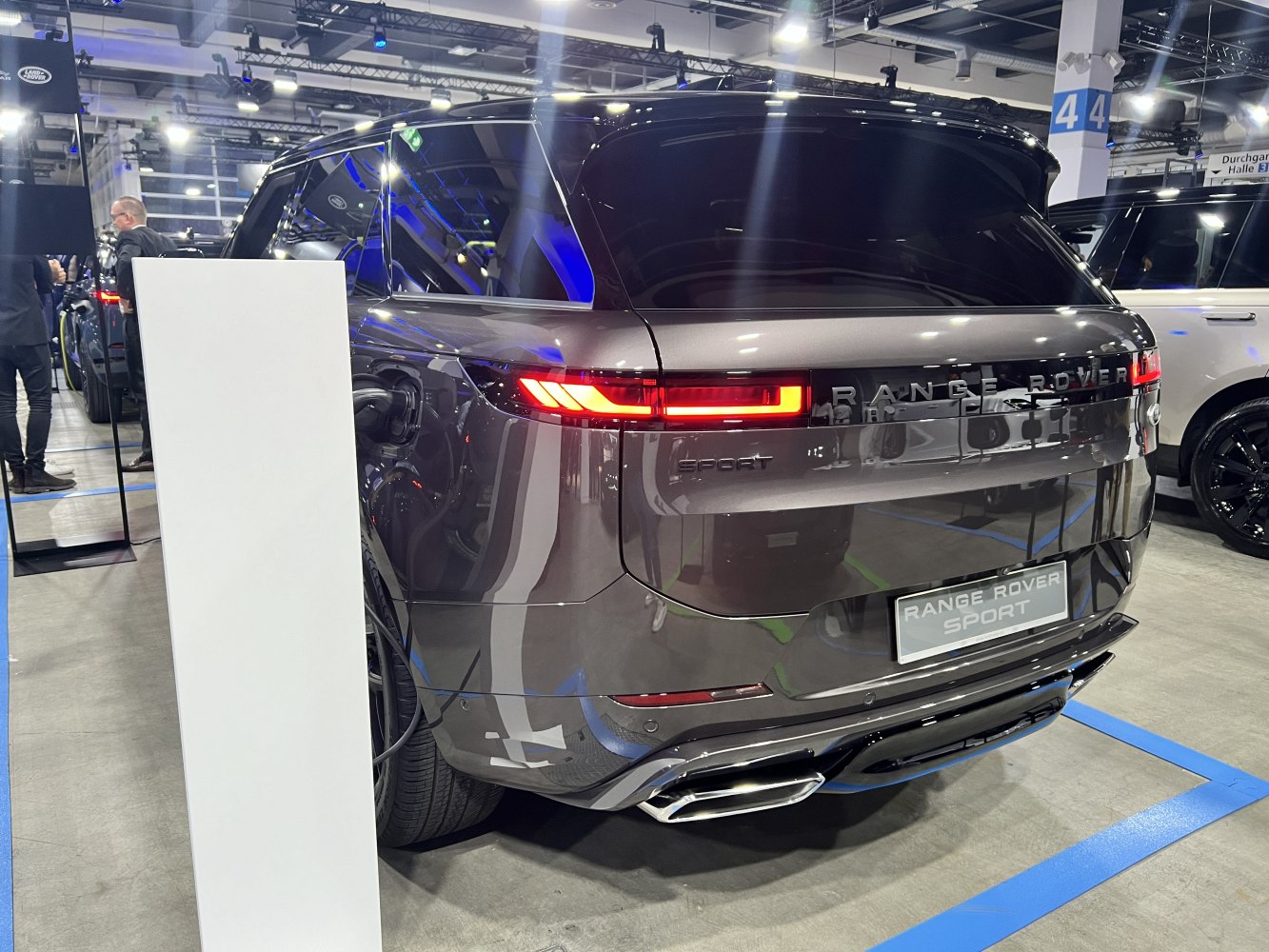 Rear view with LED taillights and electric charging port of modern SUV