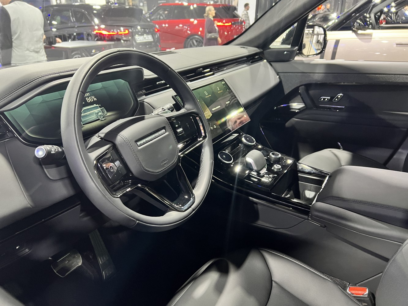 Digital dashboard and dual touchscreen center console in luxury SUV interior
