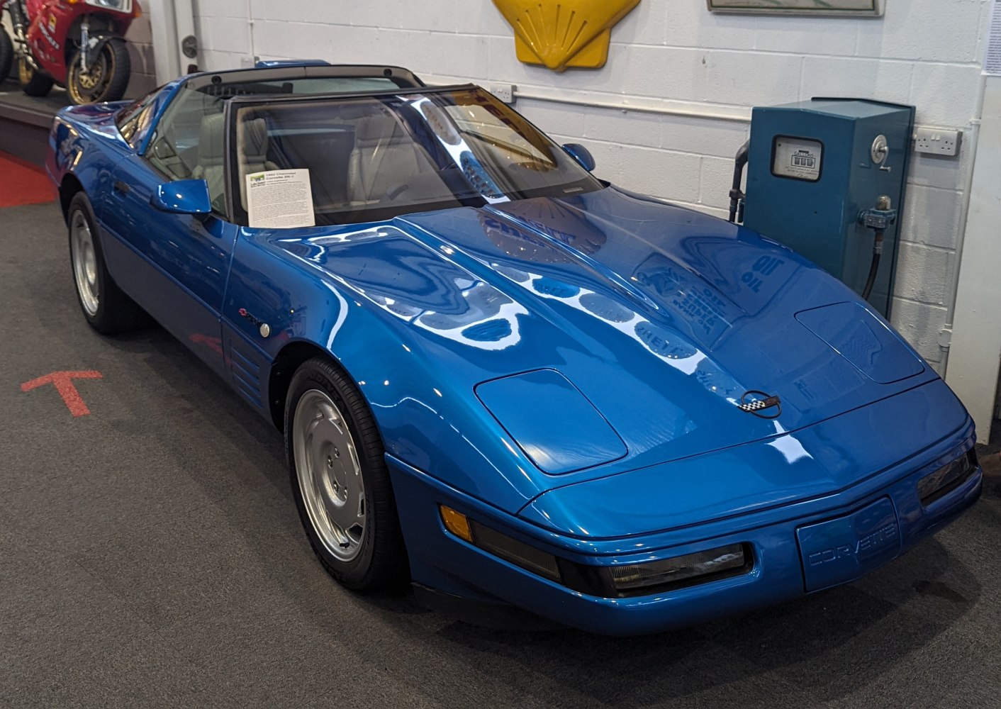 Blue classic Corvette Coupe C4 facelift with pop-up headlights