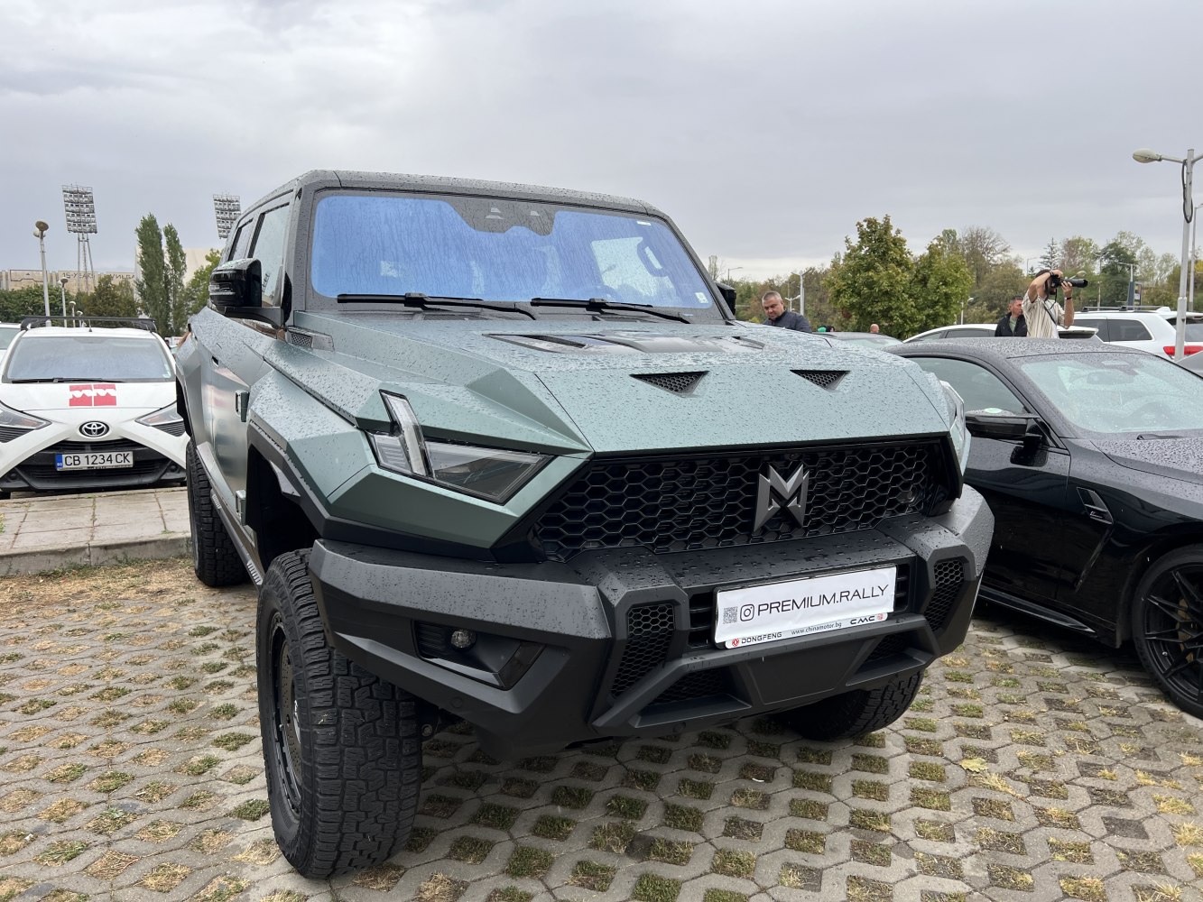 Angular front design with hexagonal grille and off-road tires