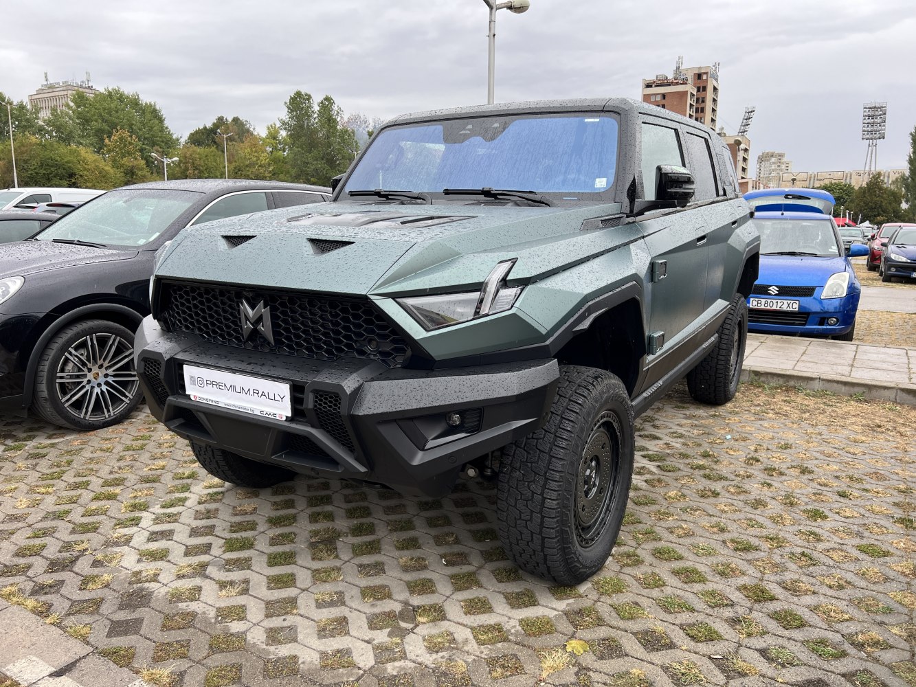 Angular SUV with aggressive hexagonal grille and rugged off-road tires