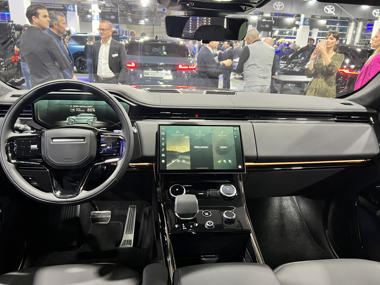 Modern digital cockpit with touchscreen infotainment and sleek dashboard design.