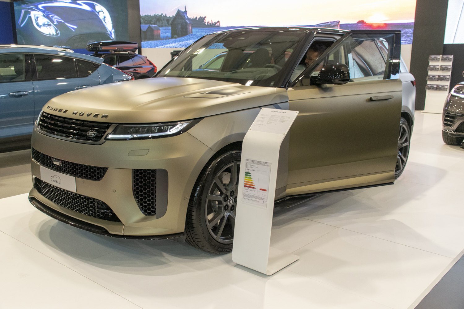 Front and side view of a luxury SUV with distinctive grille and sleek design