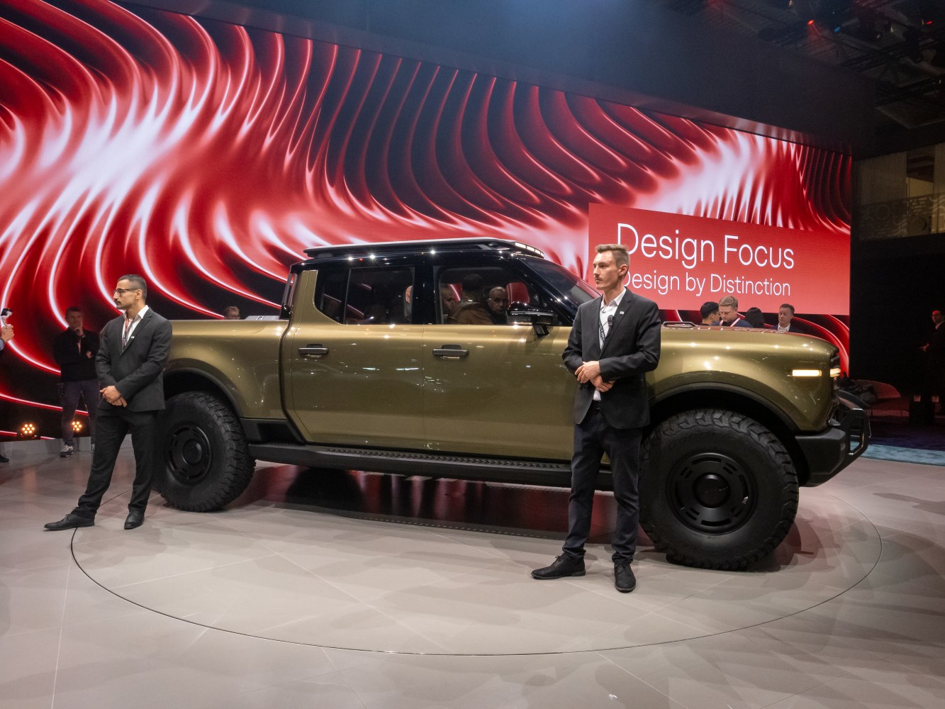 Pickup truck with rugged off-road tires and two-tone roof design