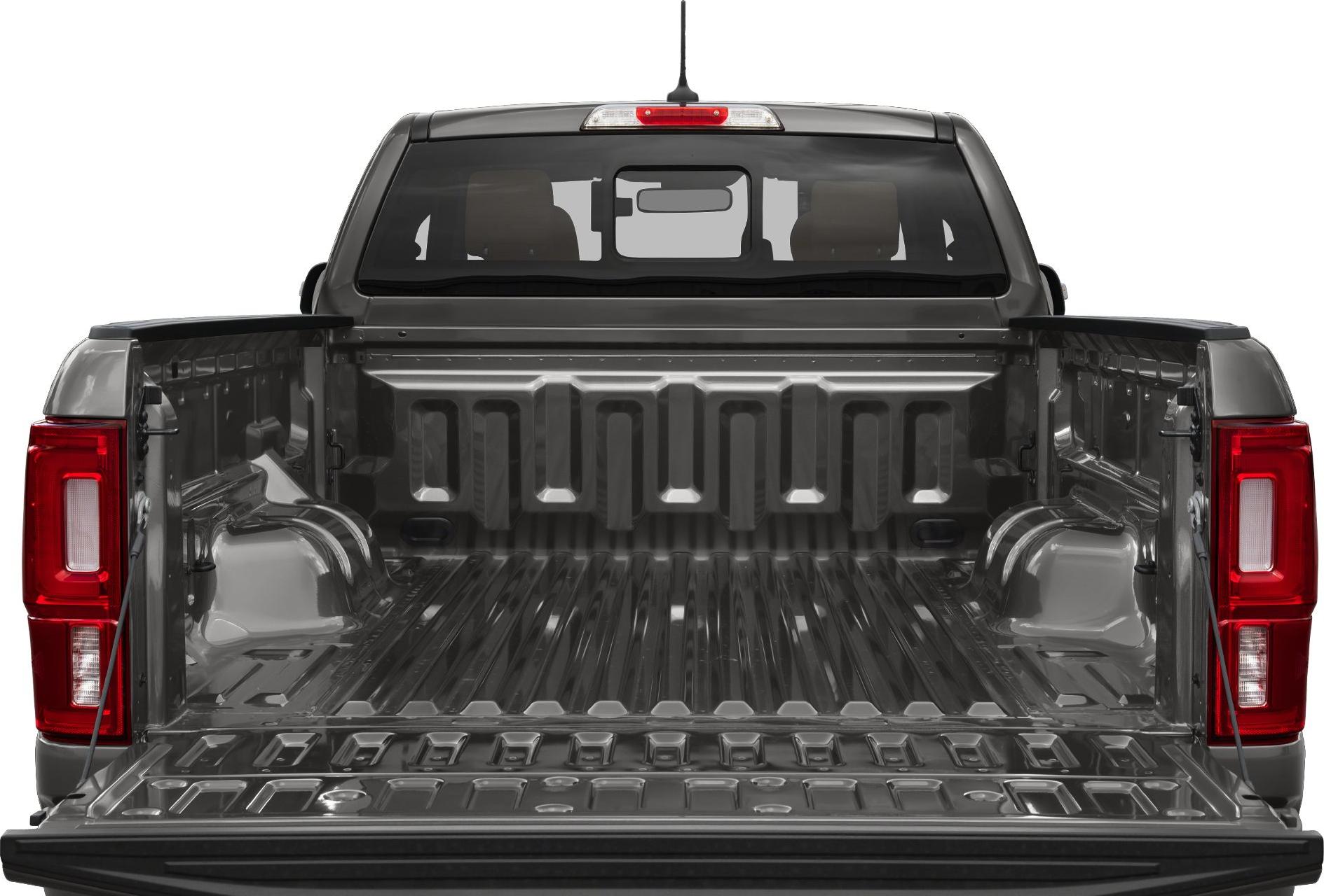 Open and spacious pickup truck cargo bed with tailgate down.
