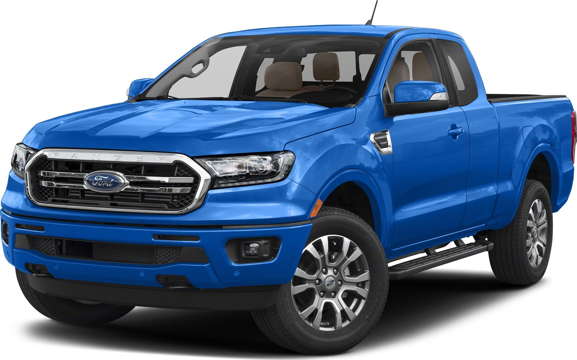 Blue pickup truck with bold front grille and alloy wheels