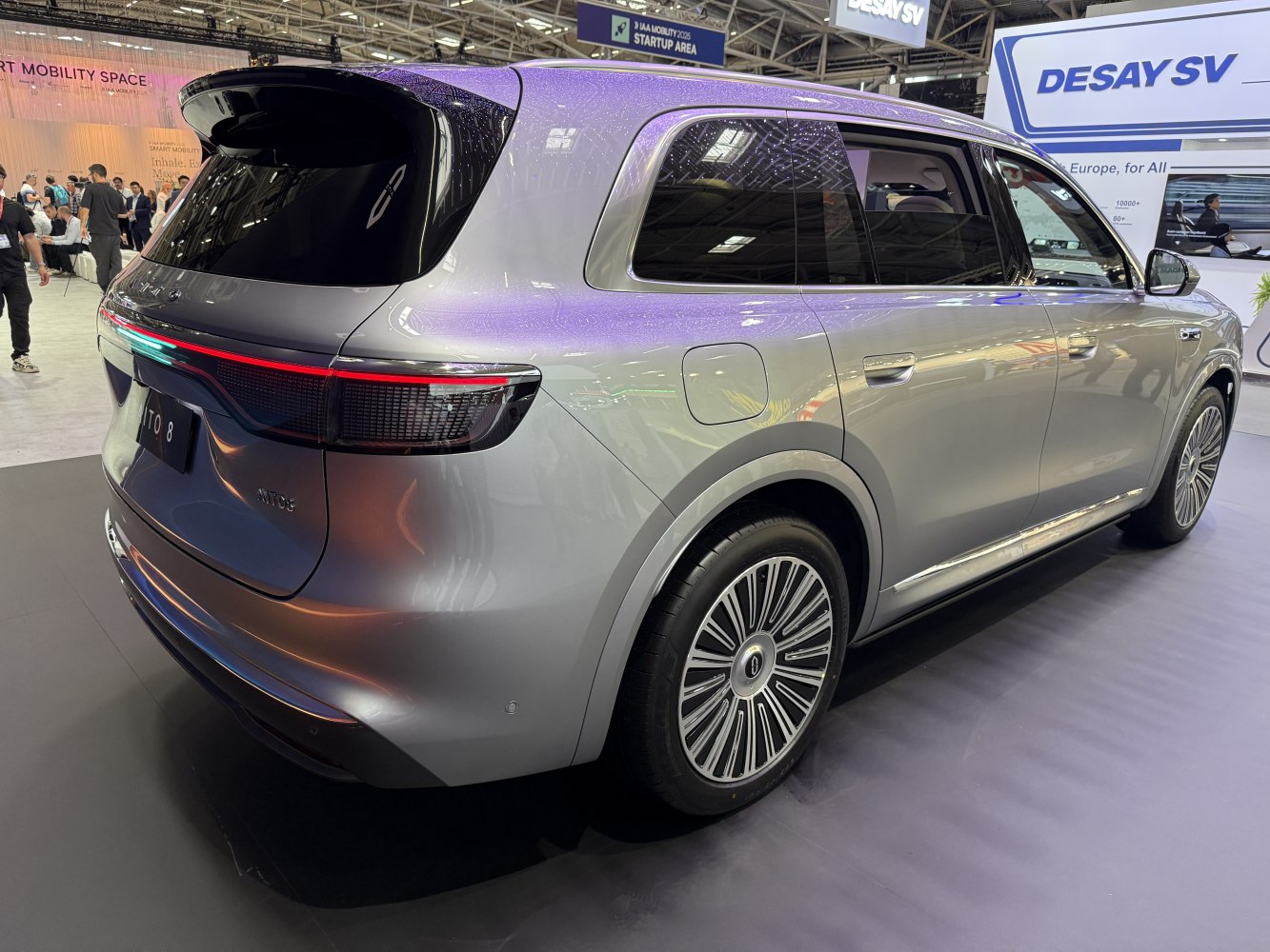 Rear and side profile of electric SUV with LED tail light and multi-spoke wheels