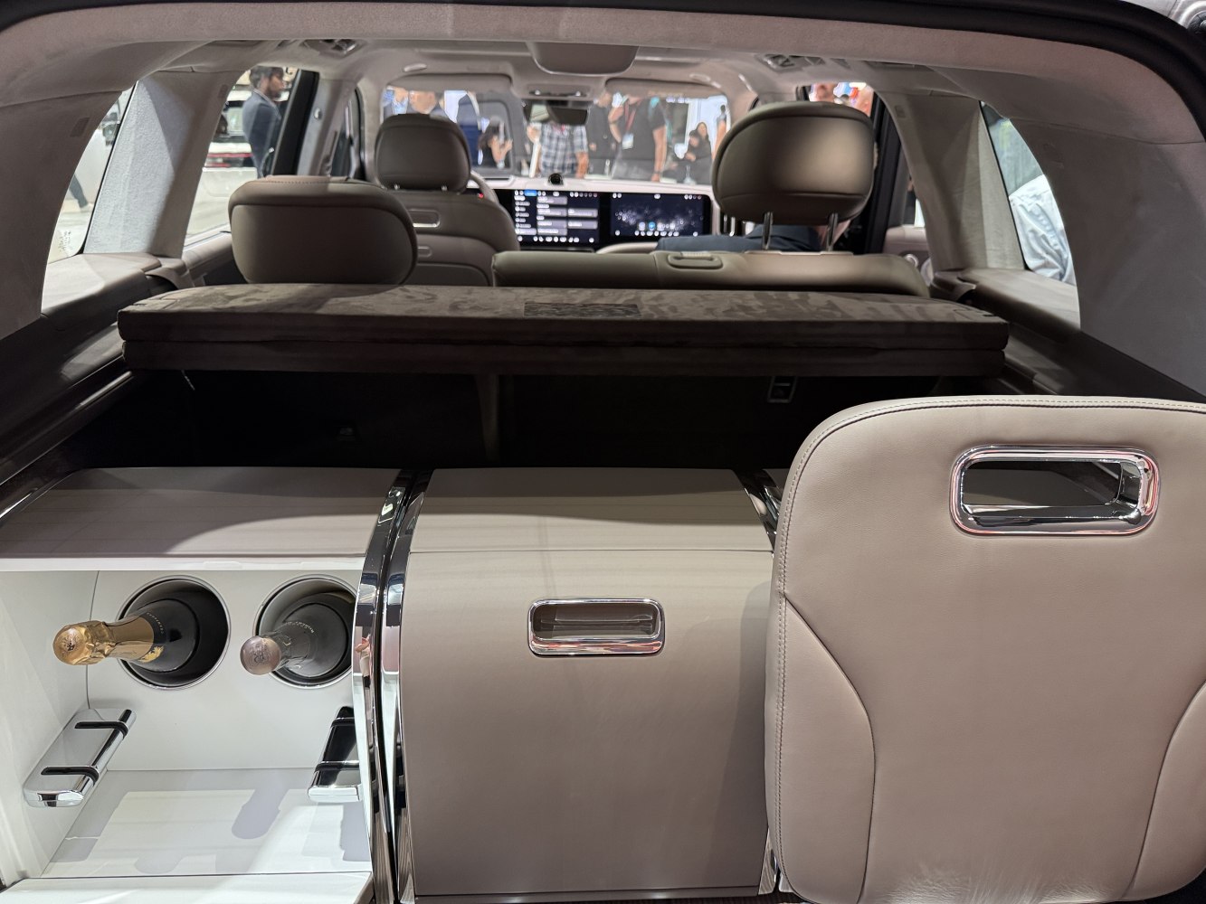 Rear interior with integrated storage and bottle holders
