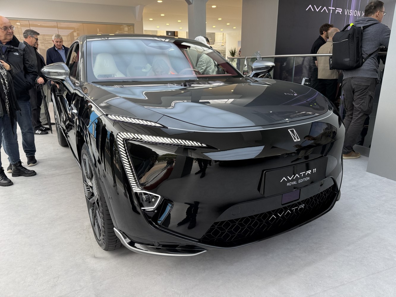 Sleek front view with distinctive LED headlights and Royal Edition badge