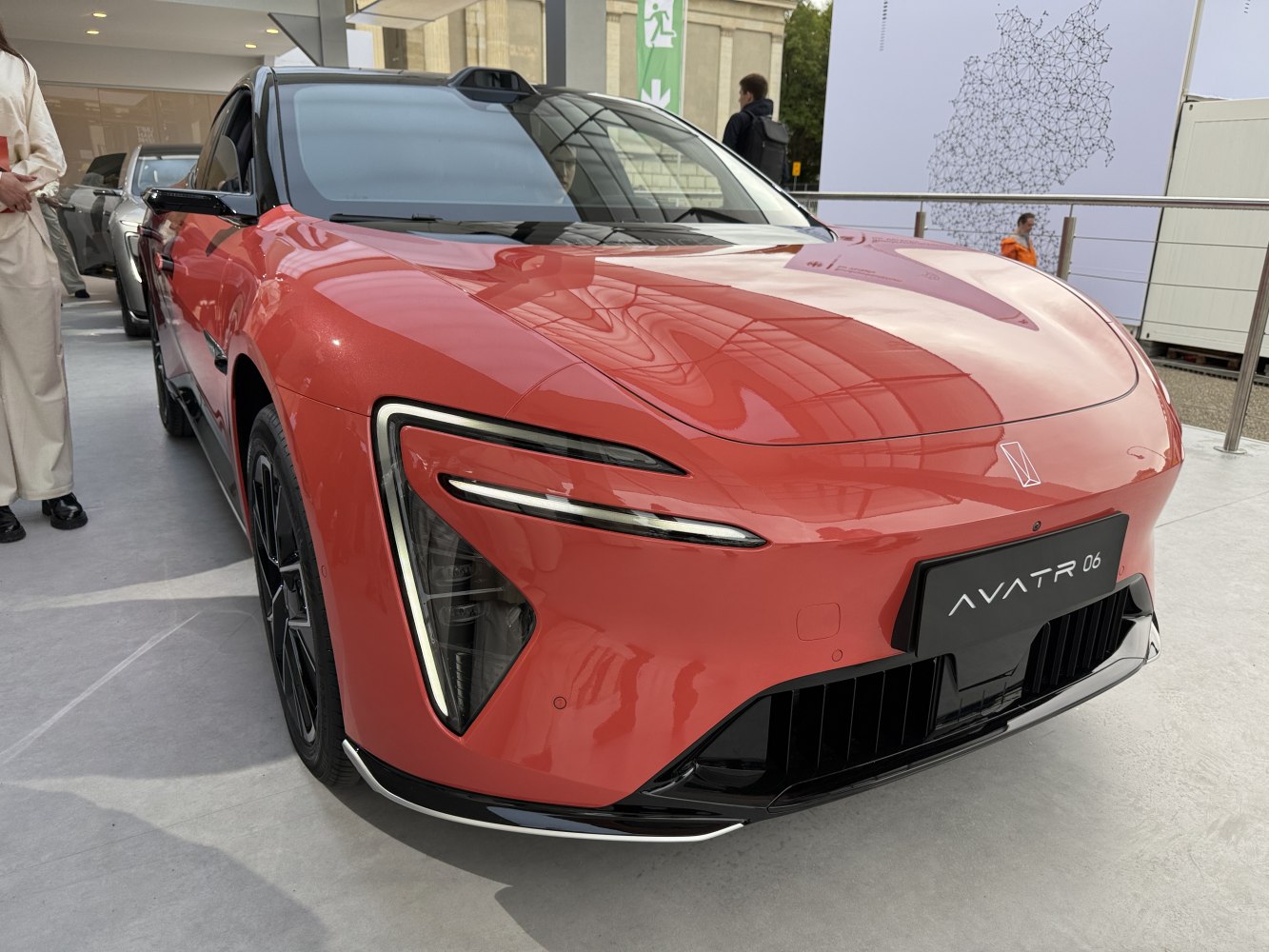 Futuristic front fascia with angular LED headlights and sleek bumper design