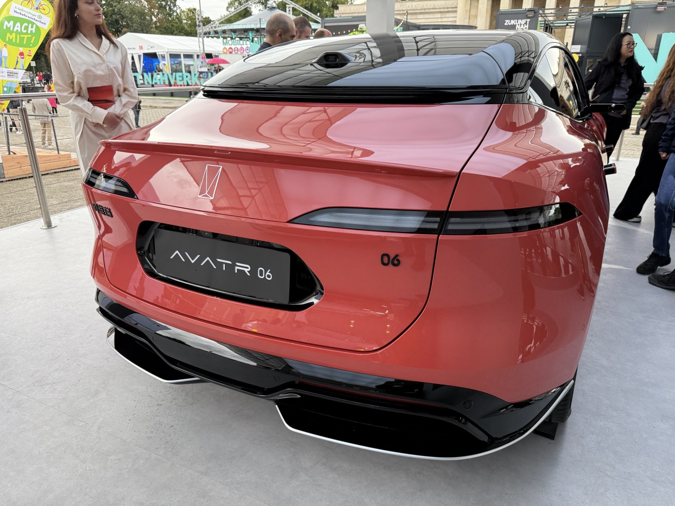 Sleek taillights and aerodynamic rear spoiler with smooth glossy surface