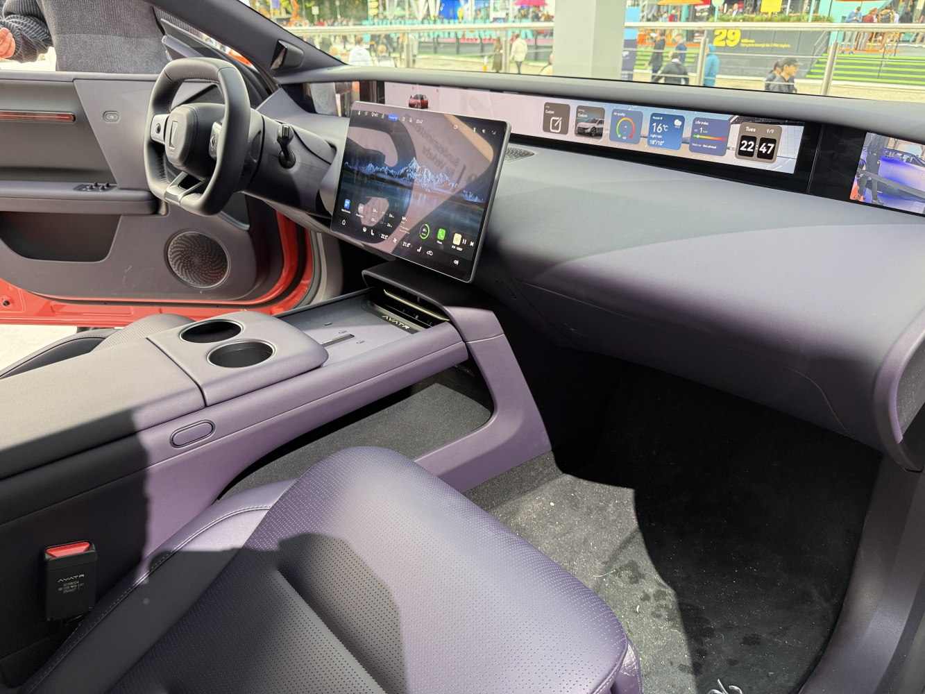 Dual digital screens and minimalist dashboard interior