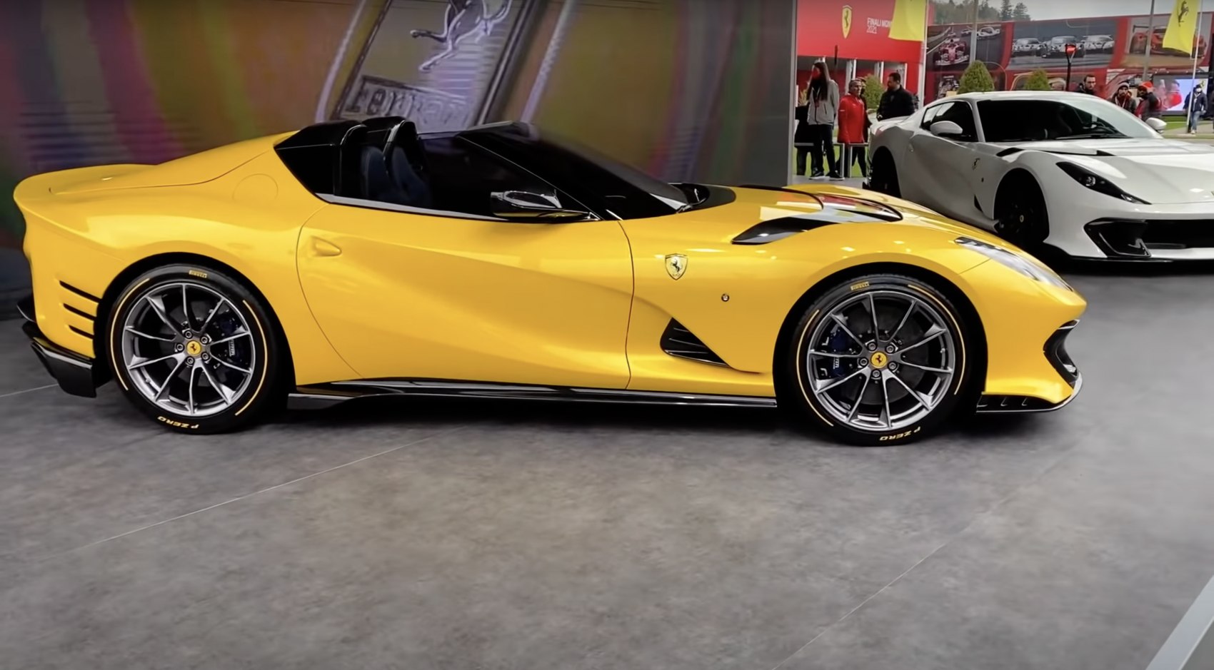 Yellow convertible with aerodynamic vents and alloy wheels