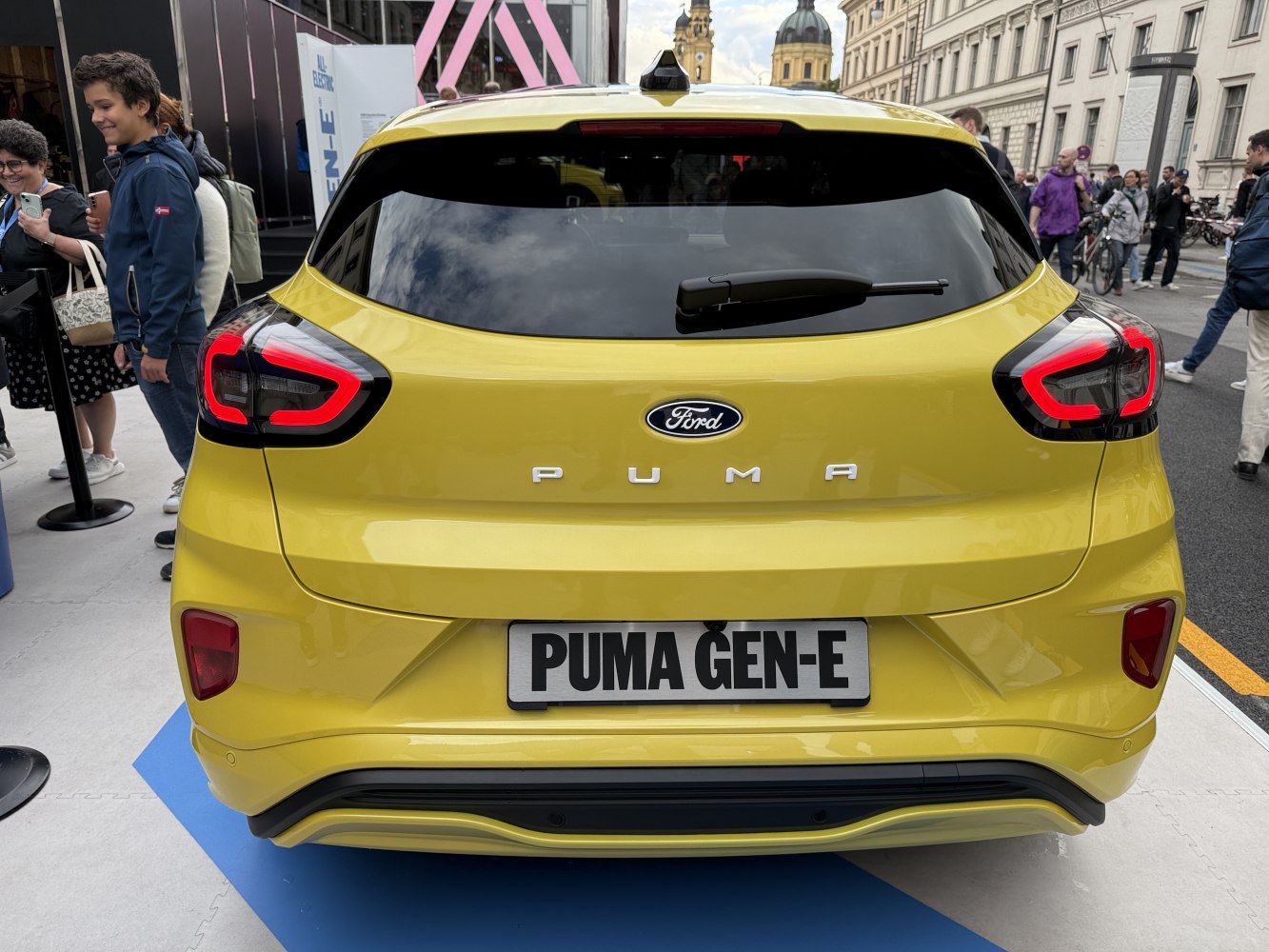 Rear view of 2024 facelift hatchback with LED taillights and sleek design