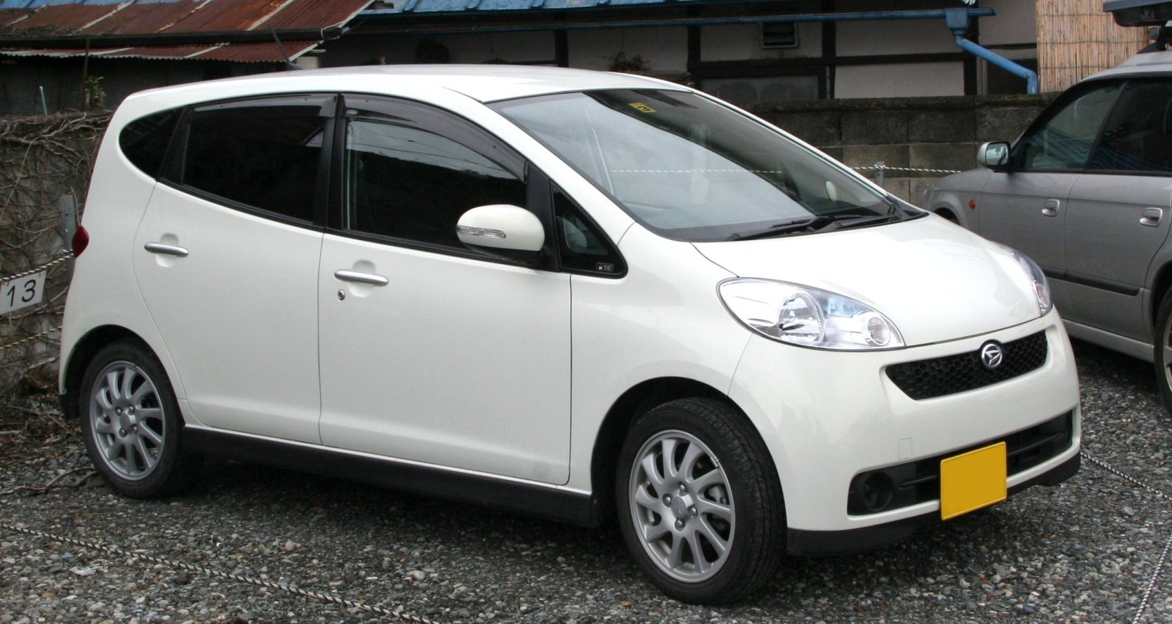 Compact hatchback with distinctive front side profile and alloy wheels
