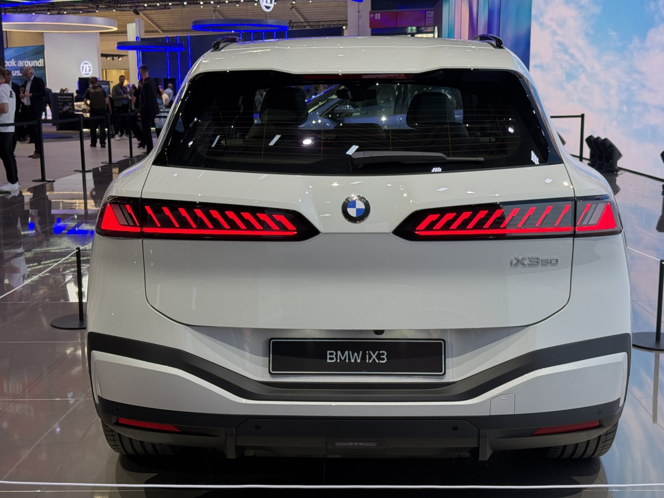 Distinctive LED taillights and rear design of a modern white electric SUV