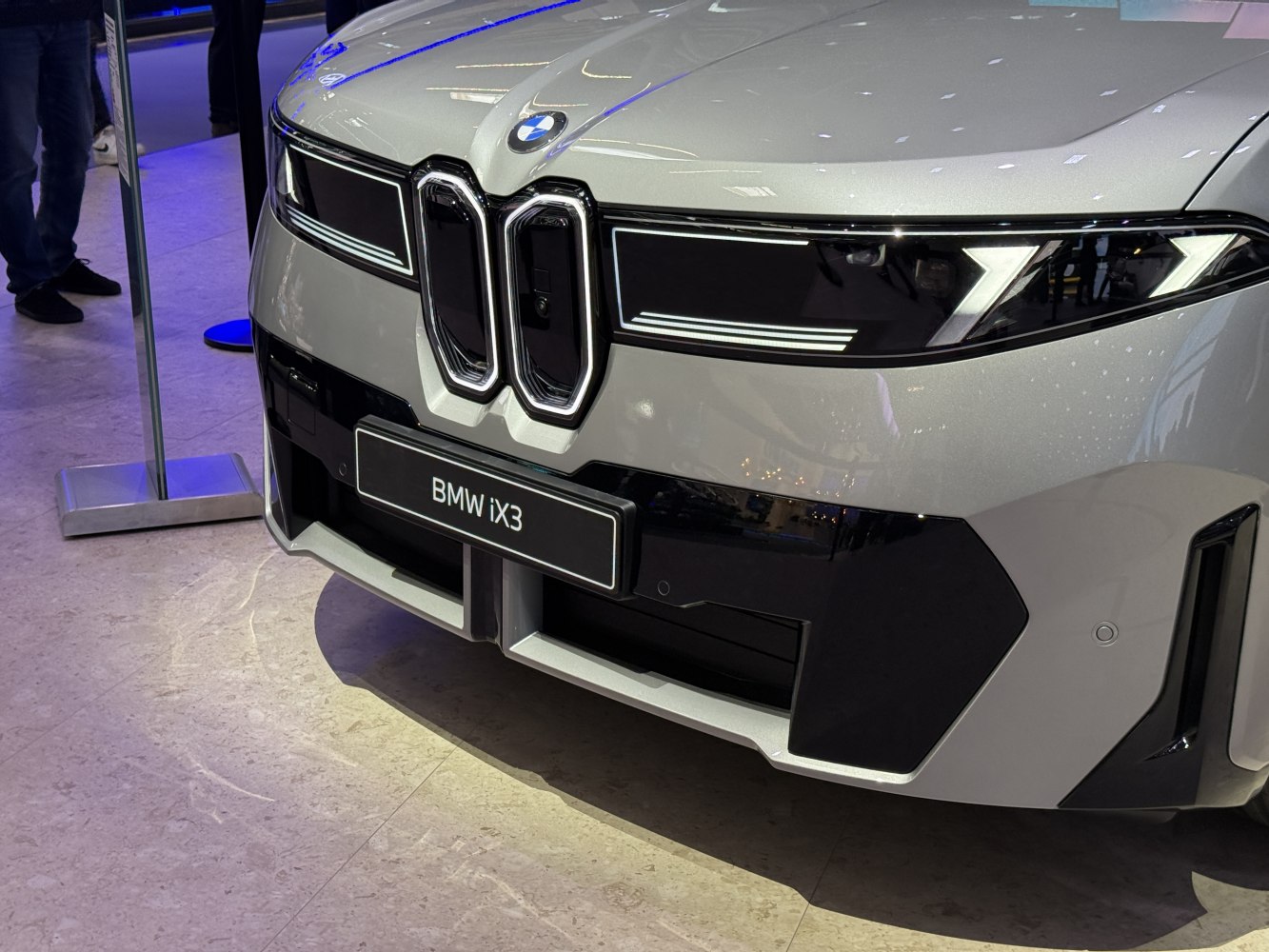 Distinctive front grille and LED headlights of modern electric SUV