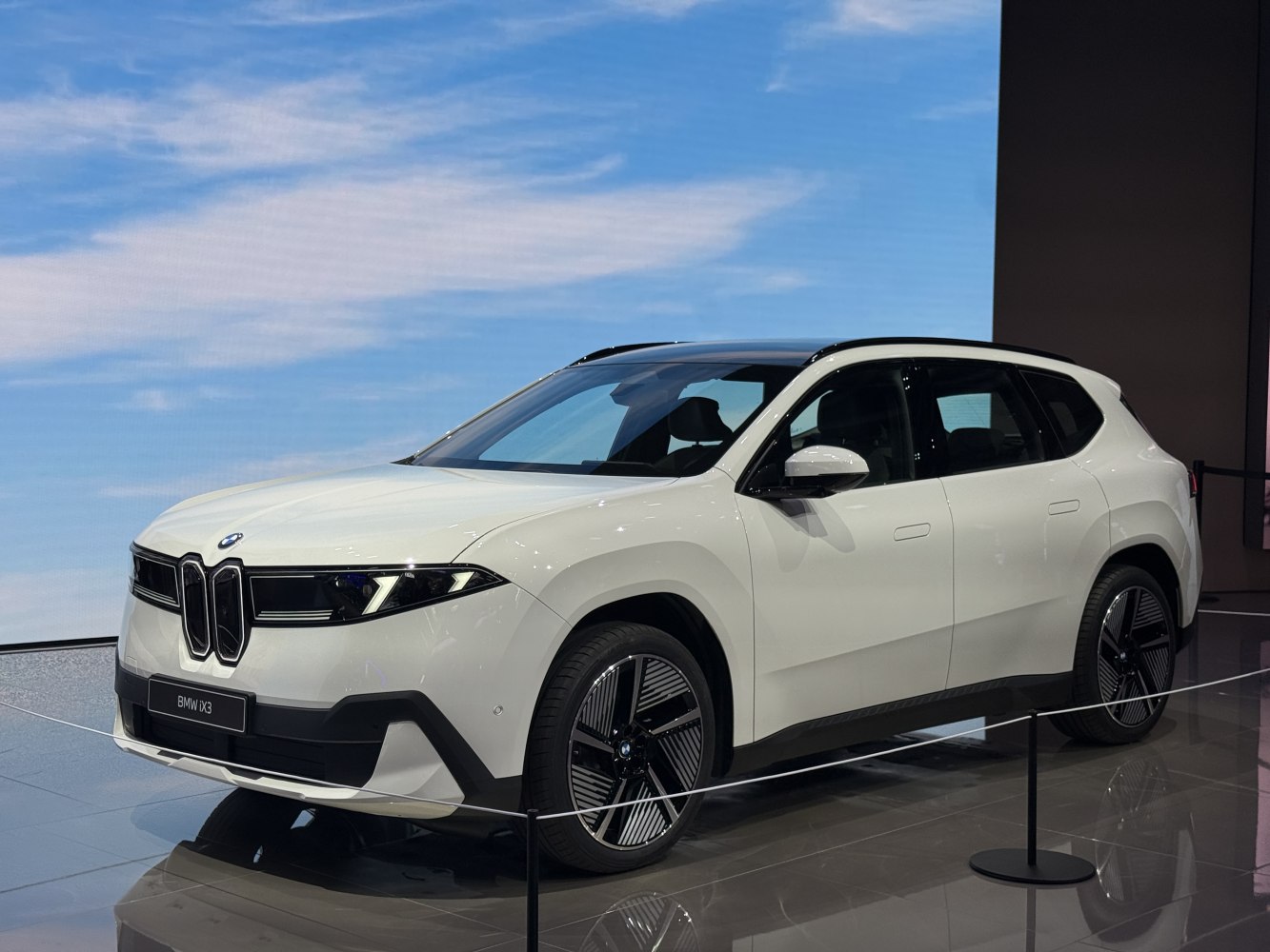 Electric SUV with distinctive front grille and futuristic LED headlights