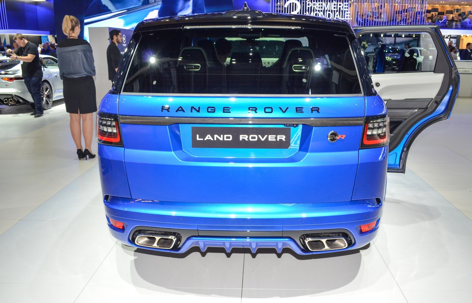 Rear view of SUV with quad exhaust tips and distinctive tailgate design