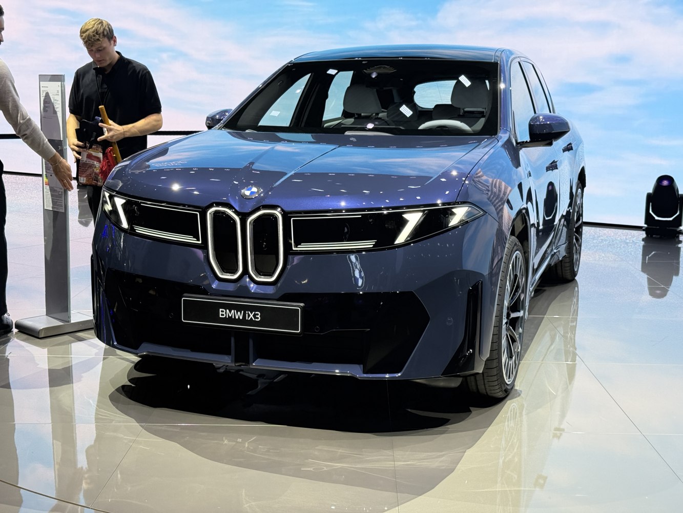 Front view showcasing bold kidney grille and LED headlights